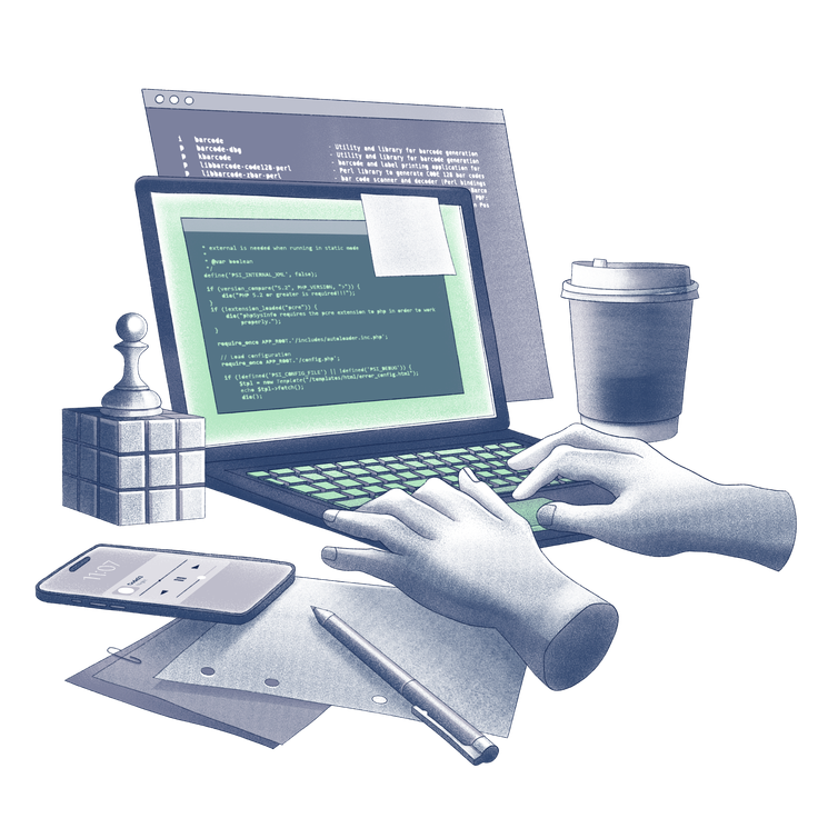 Programmer writing code on a laptop